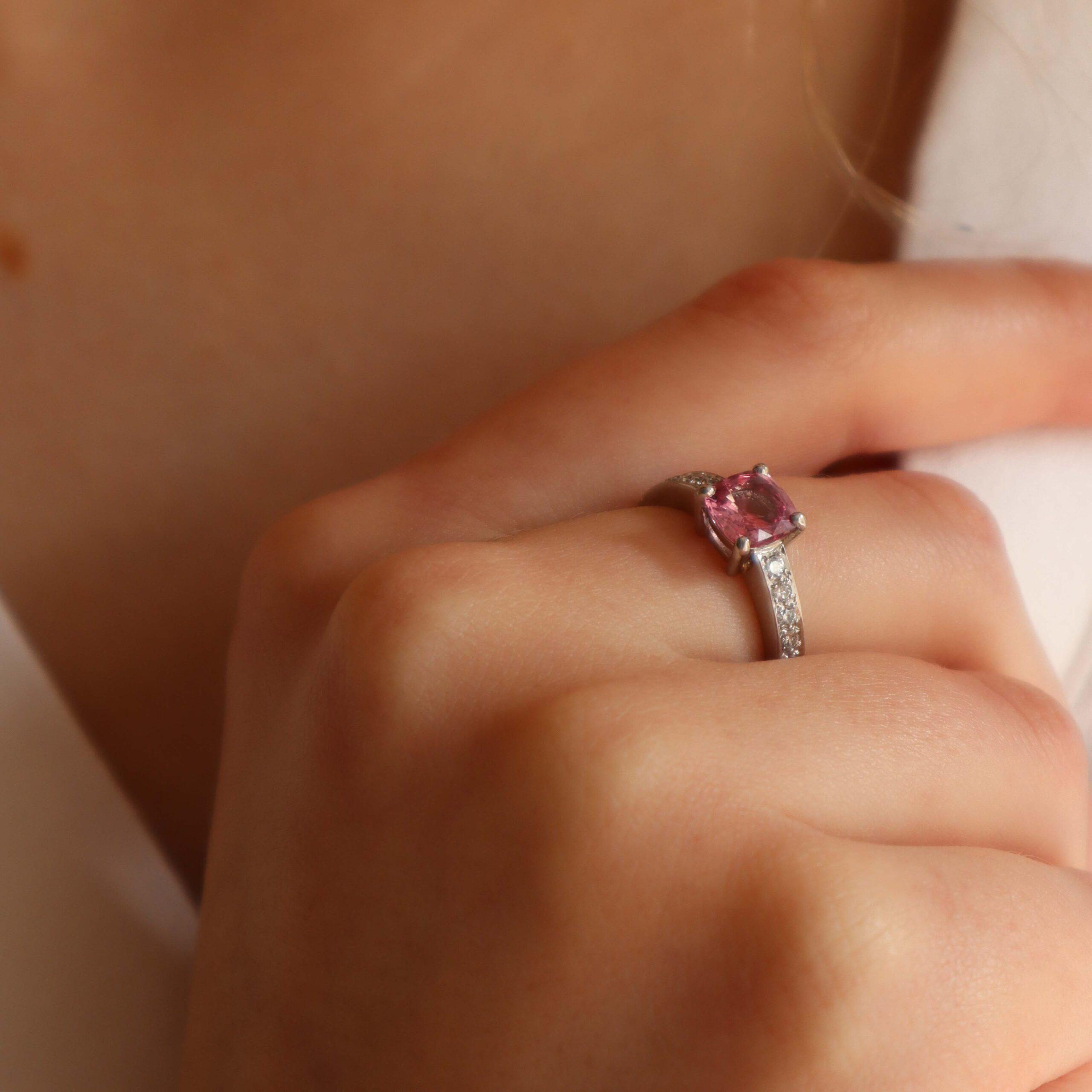 Peach pink sapphire ring in platinum