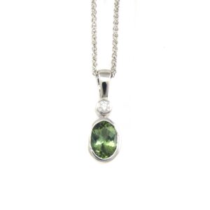 Oval green tourmaline pendant in white gold
