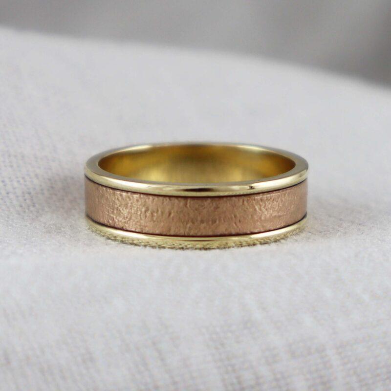 Textured 9ct rose and yellow gold wedding ring